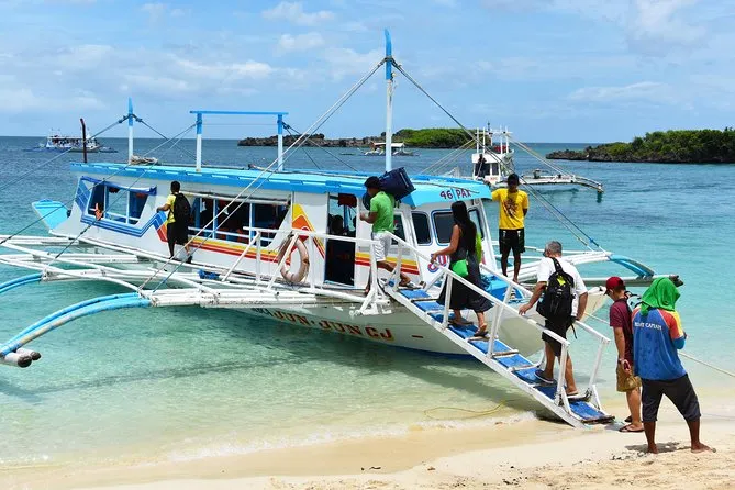 Bangka ferry crossing the Tablas Strait from Caticlan on a Boracay airport transfer tours package, Philippines